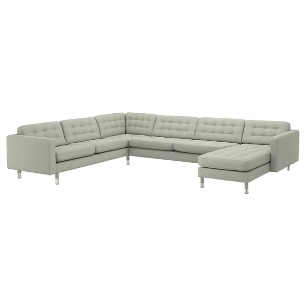 Light gray u-shaped sectional sofa with chrome legs, featuring tufted cushions and a modern design.