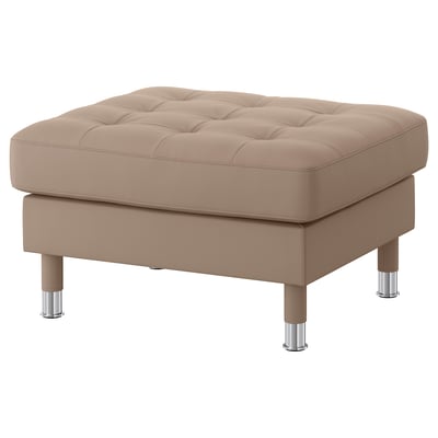 A LANDSKRONA beige footstool with tufted, grain leather top and fabric sides, supported by chrome and wood legs.