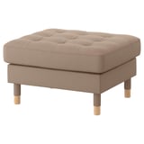 Beige LANDSKRONA upholstered footstool, square with wooden legs.