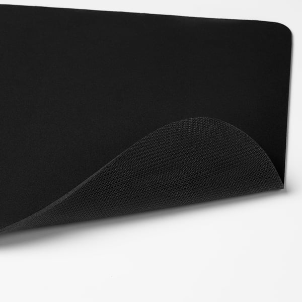 Black gaming mouse pad, smooth surface for quick mouse movements, firm and easy to clean.