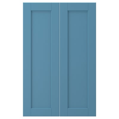 Two light blue LERHYTTAN cabinet doors with wooden panels and beveled frames.