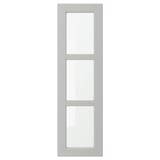A light grey LERHYTTAN kitchen cabinet door with a solid wood frame and beveled edges featuring tempered glass panels.