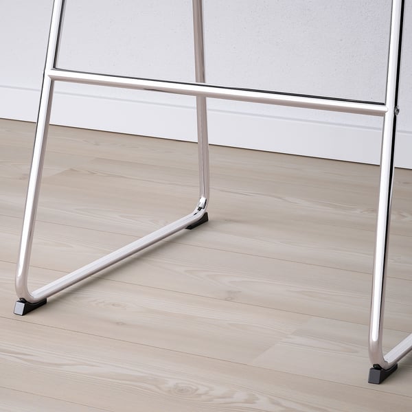 Modern bar stool with sturdy metal frame and padded seat. Light wood floor visible.