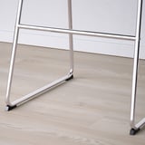 Modern bar stool with sturdy metal frame and padded seat. Light wood floor visible.