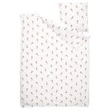 White holiday bedding set with red candy cane pattern, made from soft cotton.