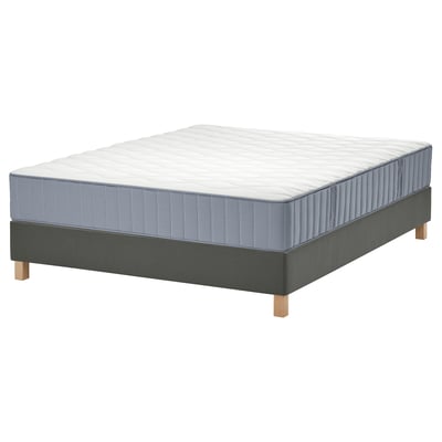 LYNGÖR bed with blue mattress, grey base, wooden legs.