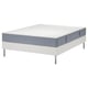 A white LYNGÖR bed set with a gray mattress. It a modern design with a sturdy frame and metal legs.