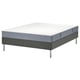 Option: Raiseable bed in white, gray, and black with mattress.