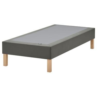 Gray upholstered low bed frame with wooden legs. Modern minimalist design. Flat, rectangular, and sturdy.