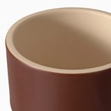 Clear, sturdy terracotta planter with smooth, even glaze inside and out, perfect for plants.