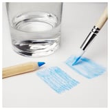Kids art tools: water glass, brush with paint, on white.