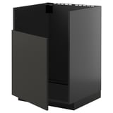 Displays a modern black kitchen cabinet, part of the METOD system. It clean lines and minimalist design.