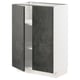 A modern METOD kitchen cabinet with dark grey concrete effect doors, white interior, and adjustable shelves.
