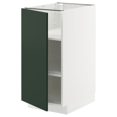 White METOD kitchen cabinet with green door, modern design.