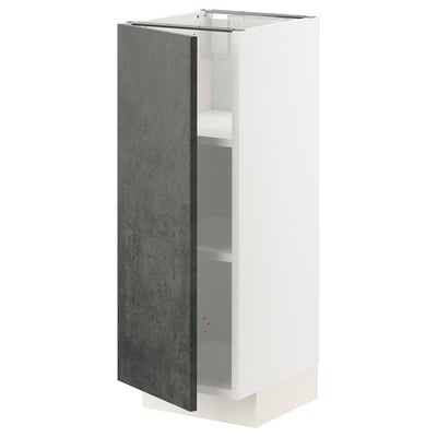 Its a white METOD kitchen cabinet with a dark grey door, left-hinged, featuring a modern, urban design.