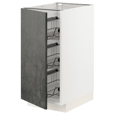 A white METOD kitchen cabinet with a dark grey kalhyttan door, featuring wire baskets inside for storage.