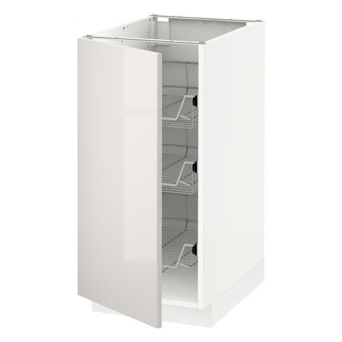A white METOD base cabinet with three wire shelves.