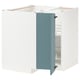 This image shows an open white corner cabinet with a blue door in a modern kitchen setup. Its part of the METOD system and adjustable shelves.