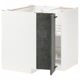 White kitchen cabinet with dark gray door, metal hinges, and adjustable shelves.