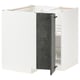 White kitchen cabinet with dark gray door, metal hinges, and adjustable shelves.