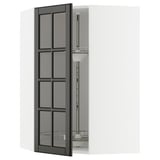 Open METOD kitchen cabinet with black glass doors featuring beveled edges.
