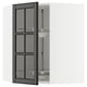 Modern black glass cabinet doors, sleek, rectangular with beveled edges, for stylish kitchen storage.