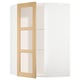 A white METOD kitchen cabinet with light wood frames and three glass shelves.