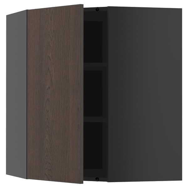 Open dark grey ikea METOD kitchen cabinet with dark wood grain door, showing interior shelves.