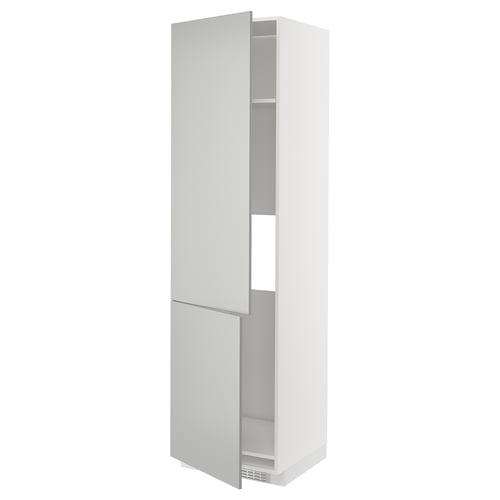 A white, tall, slim kitchen cabinet from the METOD system. It two doors and shelves inside. The cabinet is modern and minimalist in design.
