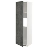 A modern, tall, white kitchen cabinet with a dark grey textured door partially open.