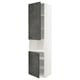 This image a white METOD kitchen cabinet with dark grey kalhyttan doors. It has an urban look and includes a tall unit with adjustable shelves.