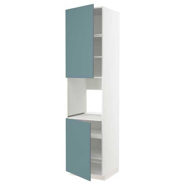 This image shows a white and turquoise kitchen cabinet from the METOD system. It open and closed turquoise doors and three shelves.