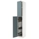 A white METOD kitchen cabinet with gray havstorp doors, open to display storage solutions.