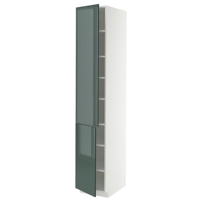 A tall white cabinet with high-gloss grey-green doors. Its vertically shaped and has adjustable shelves behind the doors.
