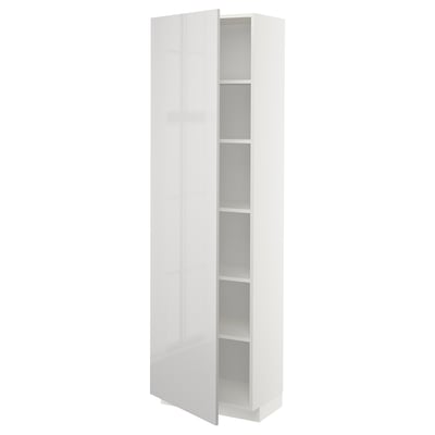 A white METOD high cabinet from ikea with a glossy finish and adjustable shelves.