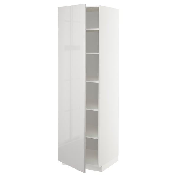 A white, tall ikea METOD cabinet. It has a glossy finish, adjustable shelves, and a door that can be mounted on either side.