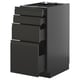 Modern black kitchen cabinet with four smooth, integrated handle drawers in a sleek, contemporary design.