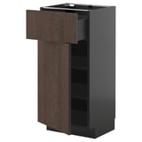 Modern kitchen cabinet: METOD with dark brown sinarp wood, one open drawer, two shelves.