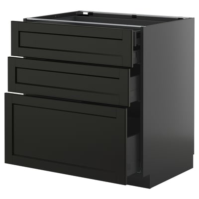 Black kitchen unit with drawers, modern design.