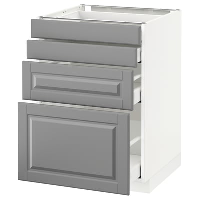 Modern grey drawers and cabinet, white frame, pull-out drawers, beveled edges.