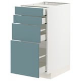 Modern kitchen unit with four turquoise blue drawers and white base, sleek and organized.