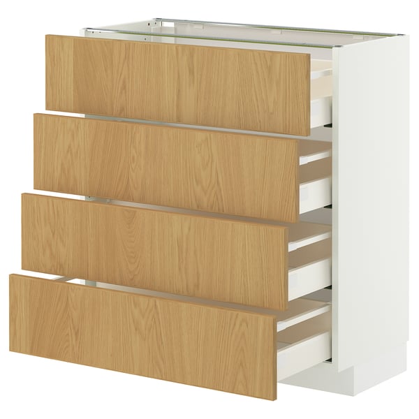 An IKEA METOD kitchen unit in white with oak drawers. Its a modern, rectangular design with four full-extension drawers.
