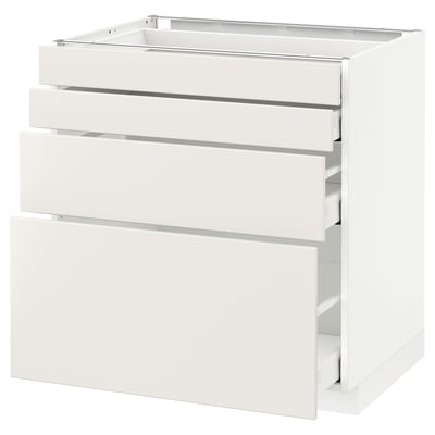 White METOD kitchen cabinet with three smooth veddinge drawers.