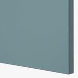 Close-up of smooth, modern blue kitchen cabinet, showing sleek finish and sturdy build.