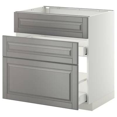 Modern kitchen cabinet set in light grey with smooth drawers, featuring a traditional design and sturdy build.