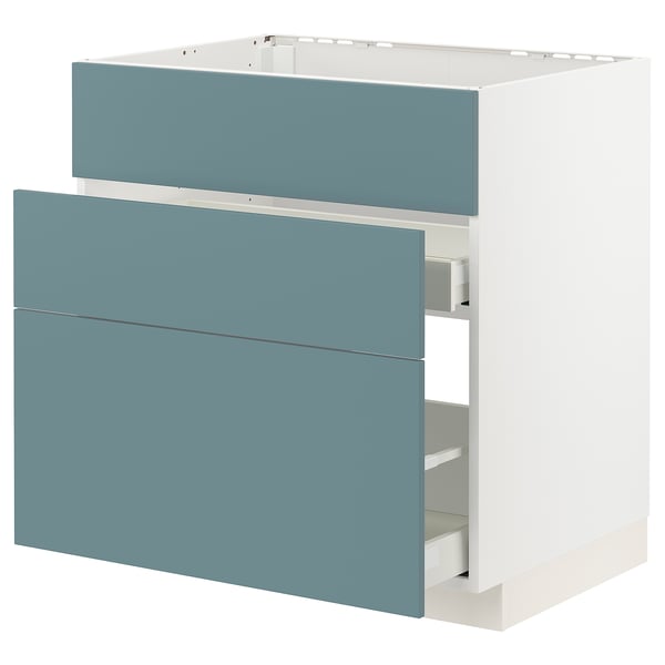 Turquoise METOD kitchen cabinet with smooth drawers.