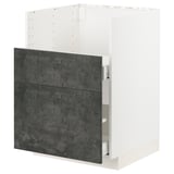 A METOD kitchen cabinet in grey with a concrete effect finish. It soft-close drawers and a white frame.