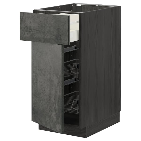 METOD kitchen unit in dark grey with concrete effect. A large, smooth drawer and wire baskets for storage.