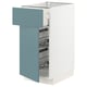 A METOD kitchen cabinet with a turquoise drawers and a white frame. It multiple wire shelves inside the drawer.