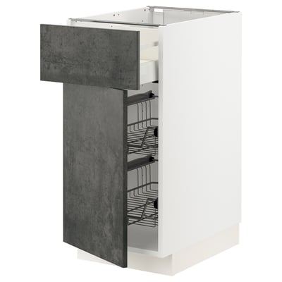 White METOD kitchen cabinet with dark gray door, wire baskets.